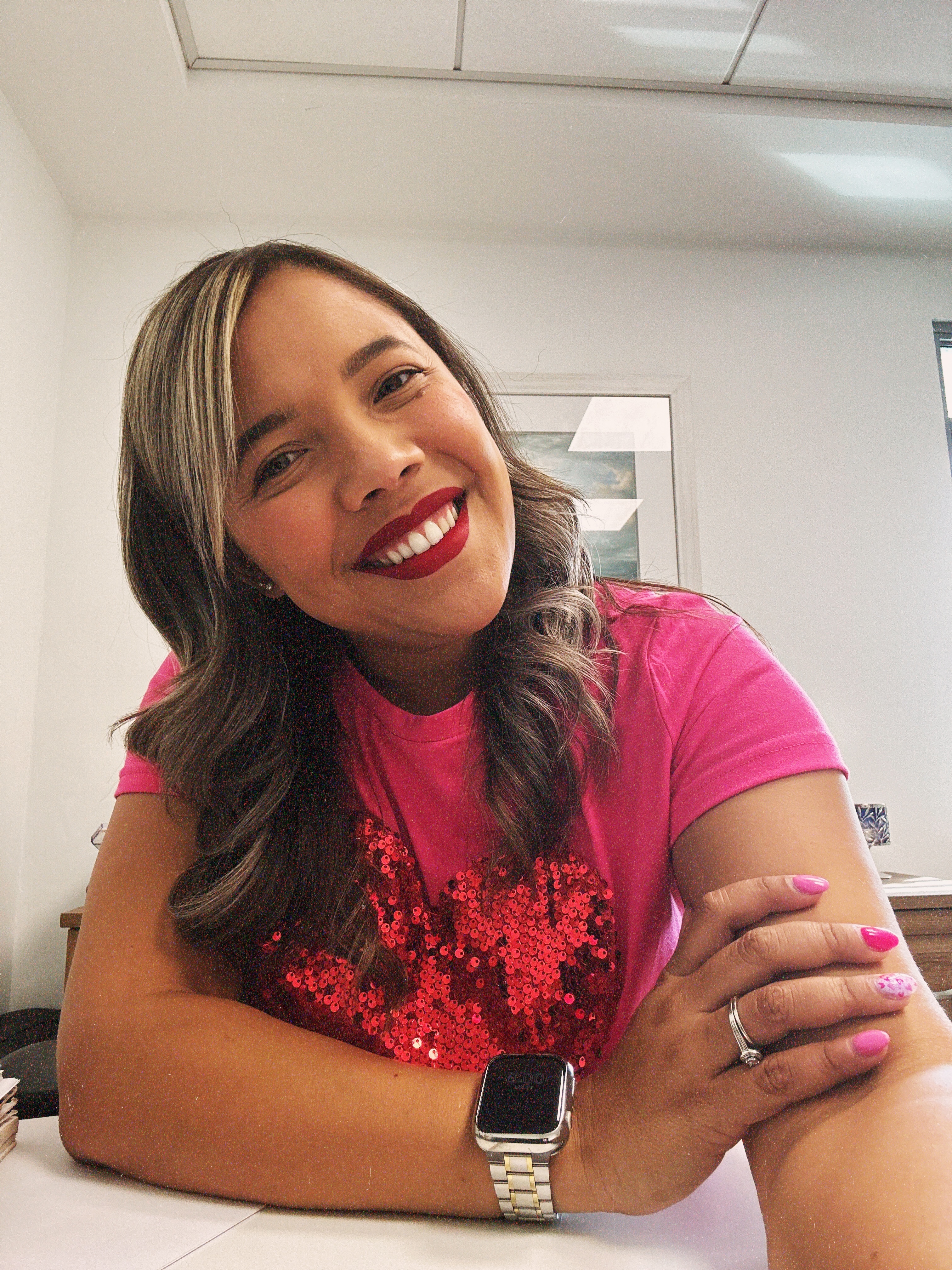 Yarialis, founder of Nail Therapy by Yarialis, smiling warmly